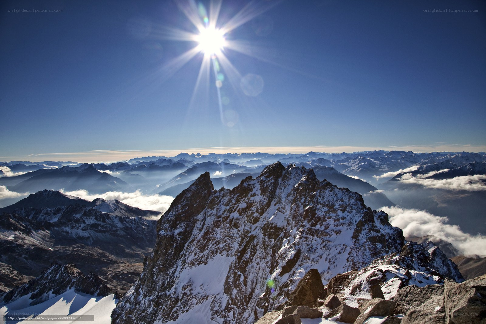 Sunrise over snow-capped mountains