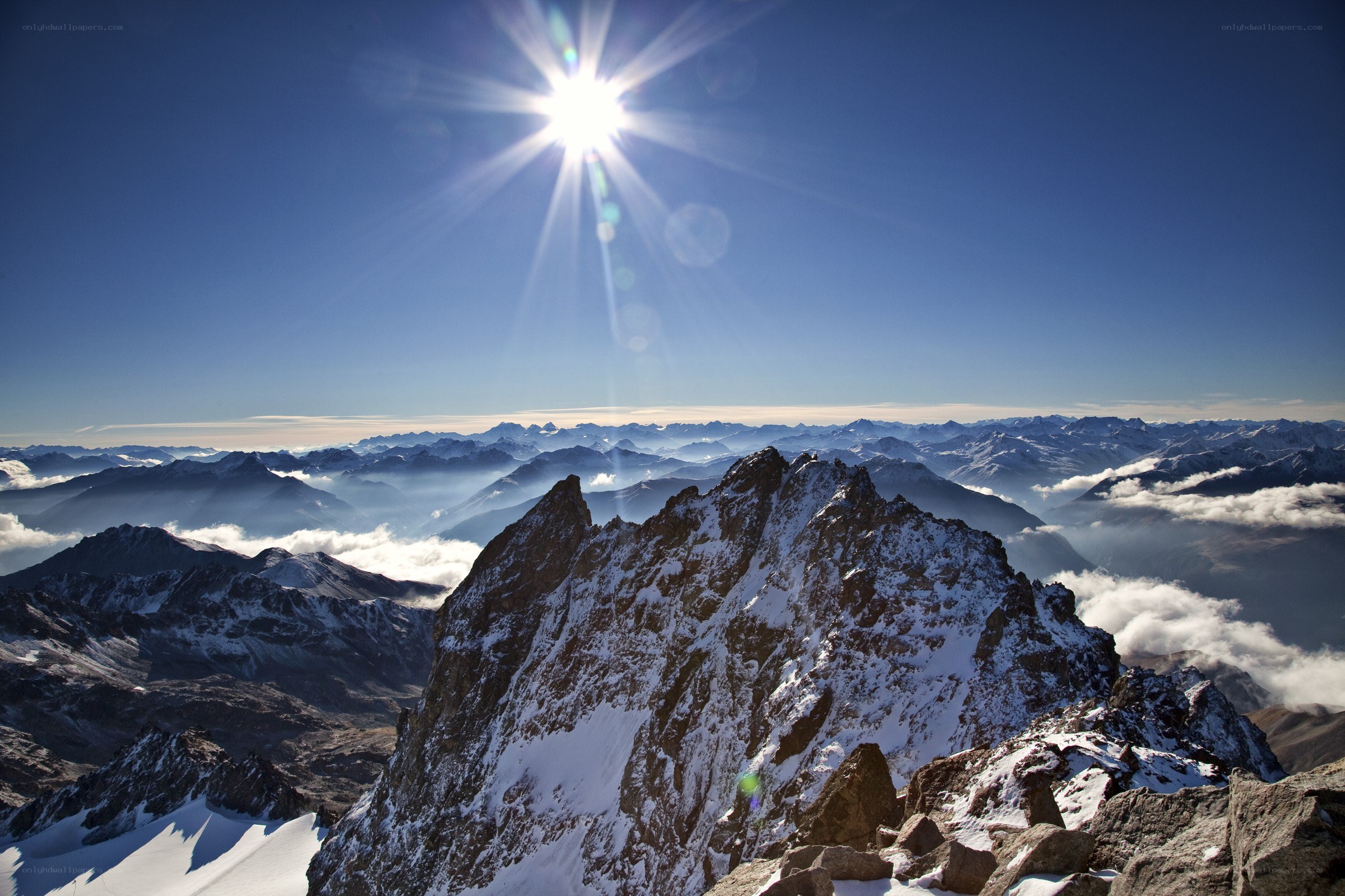 Sunrise over snow-capped mountains