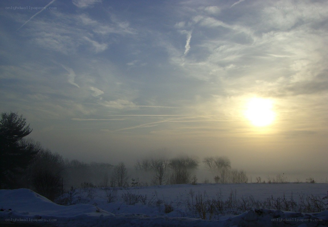 Sunrise over snowy landscape