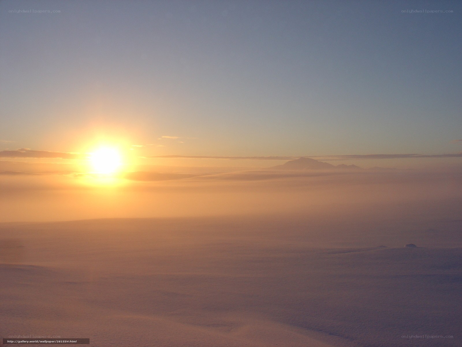 Sunrise over snowy landscape