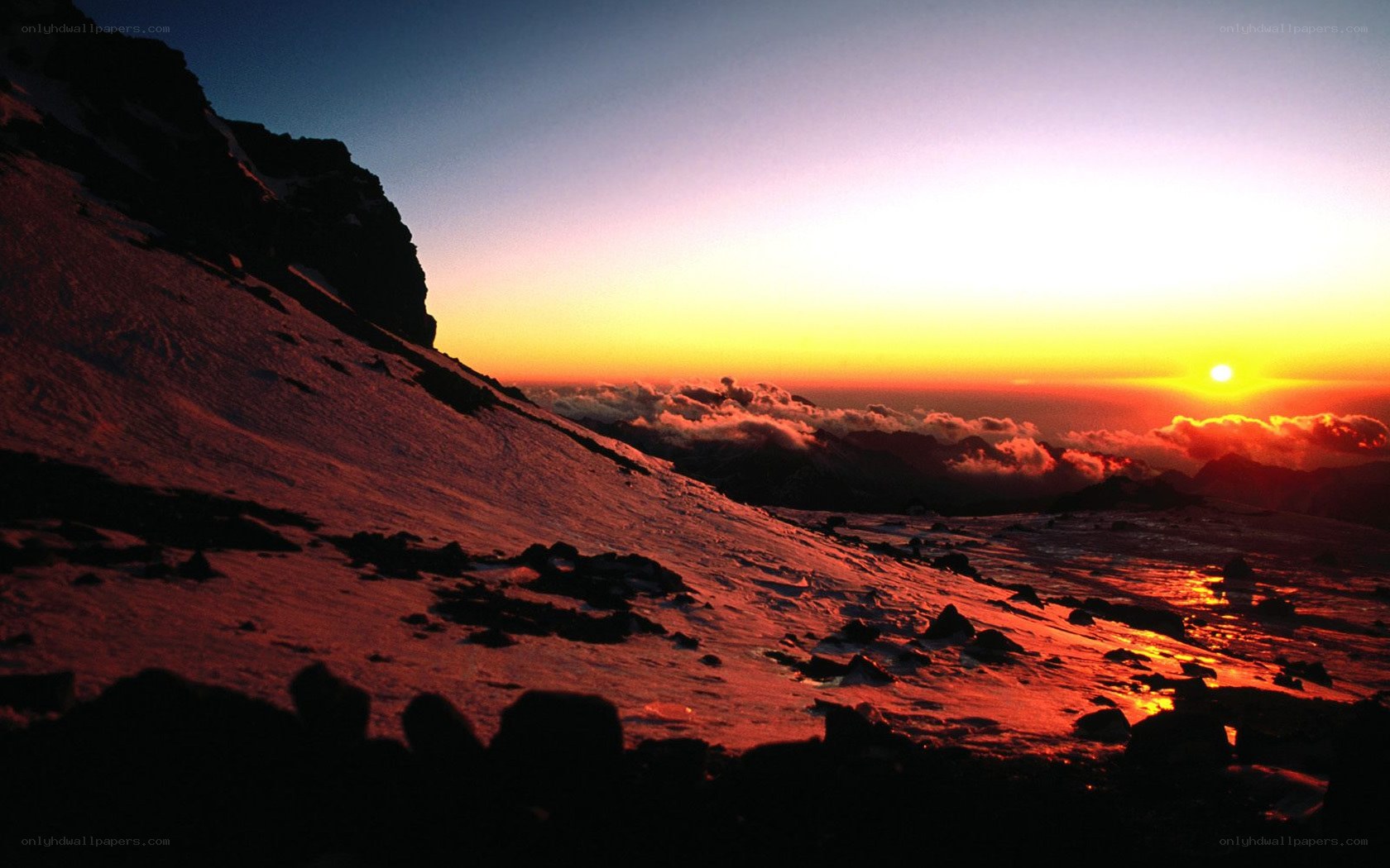 Sunrise over snowy mountain