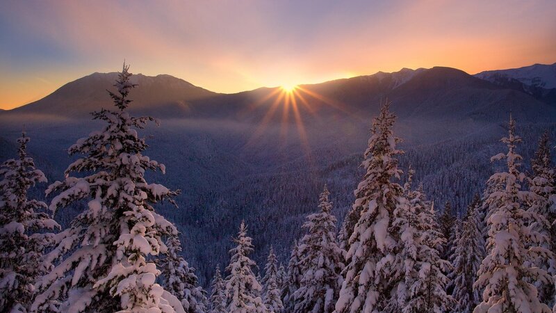 Sunrise over snowy mountains