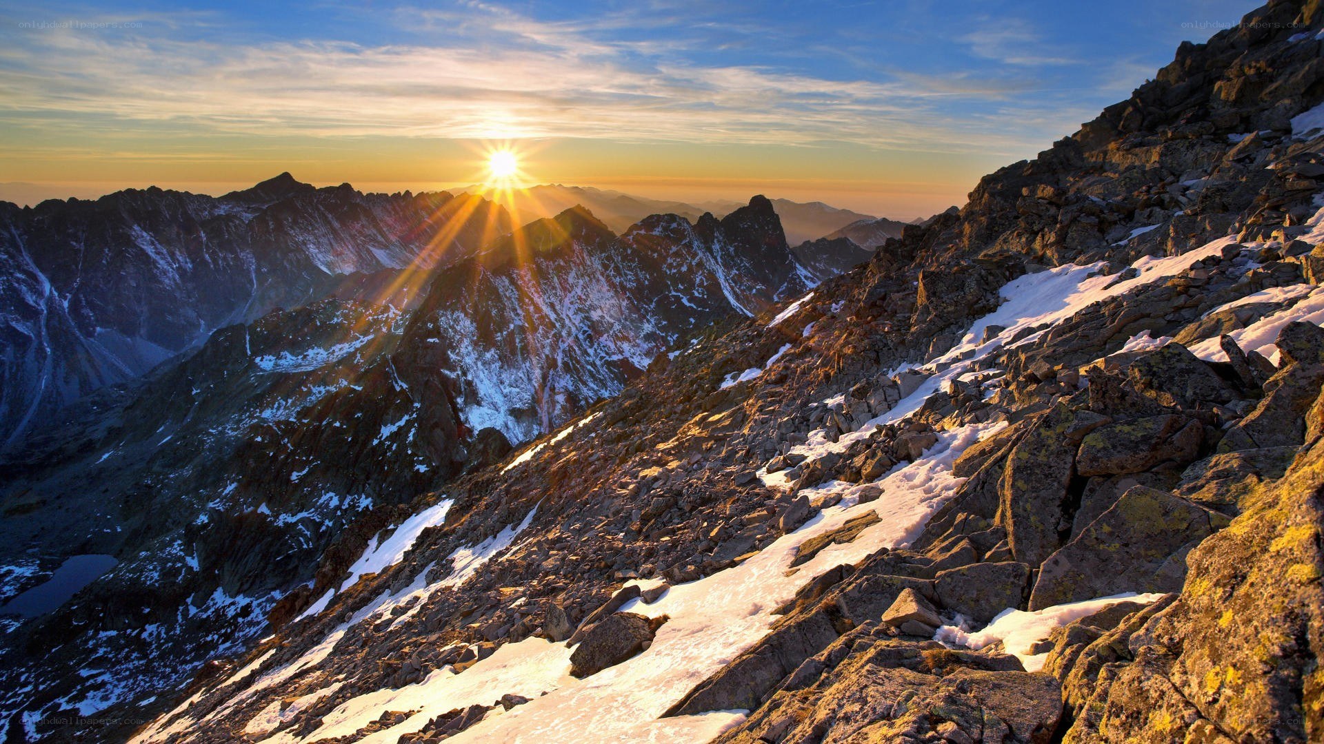 Sunrise over snowy mountains