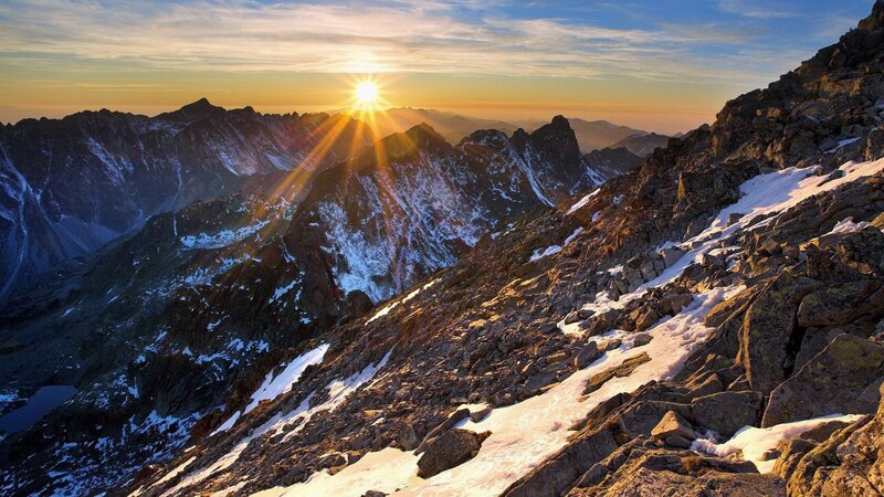 Sunrise over snowy mountains