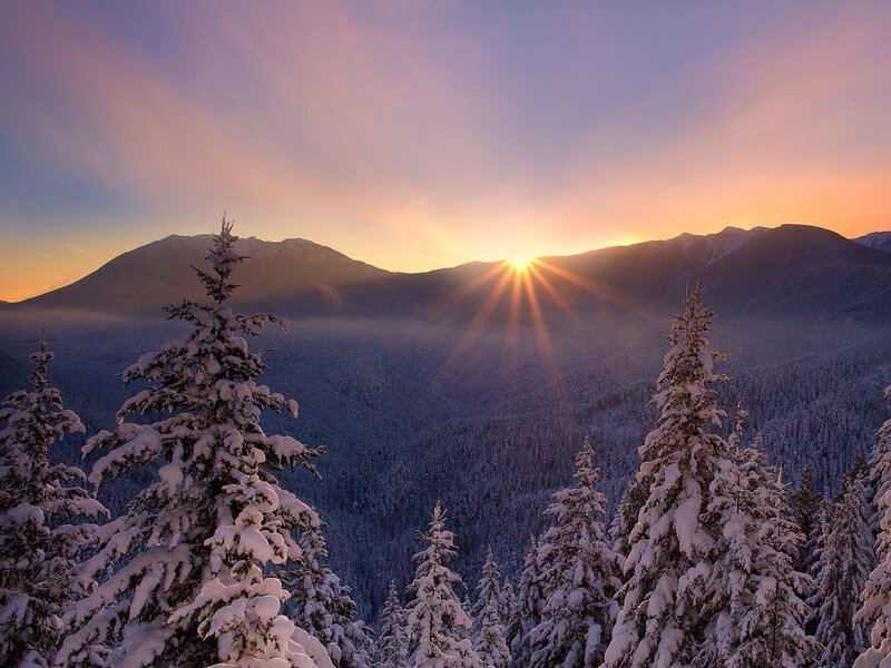 Sunrise over snowy mountains