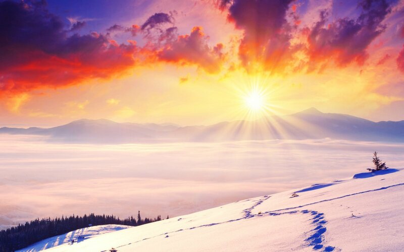Sunrise over snowy mountains