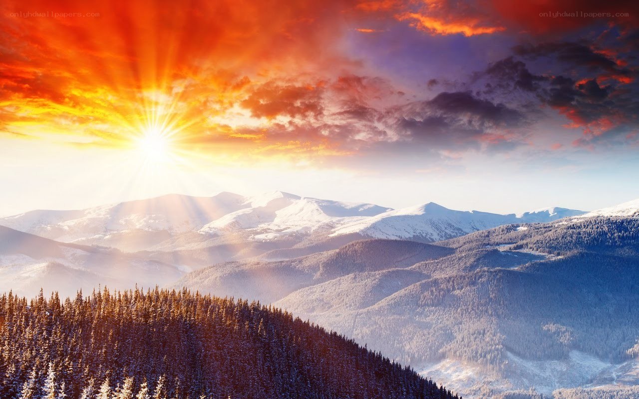 Sunrise over snowy mountains