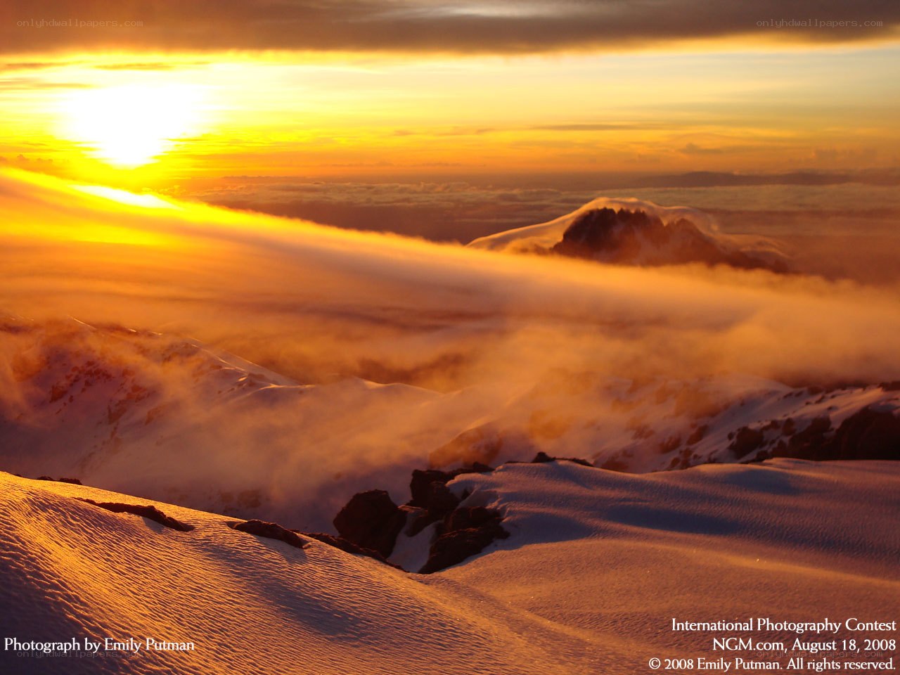 Sunrise over snowy mountains