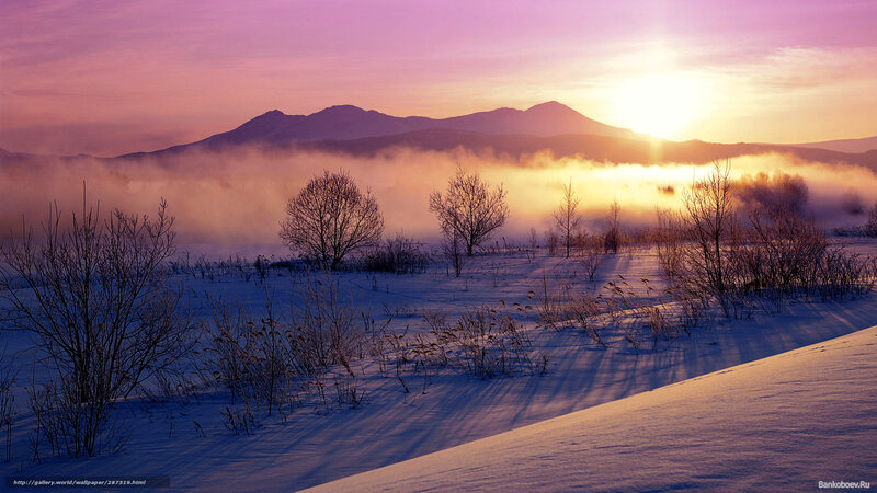 Sunrise over snowy mountains