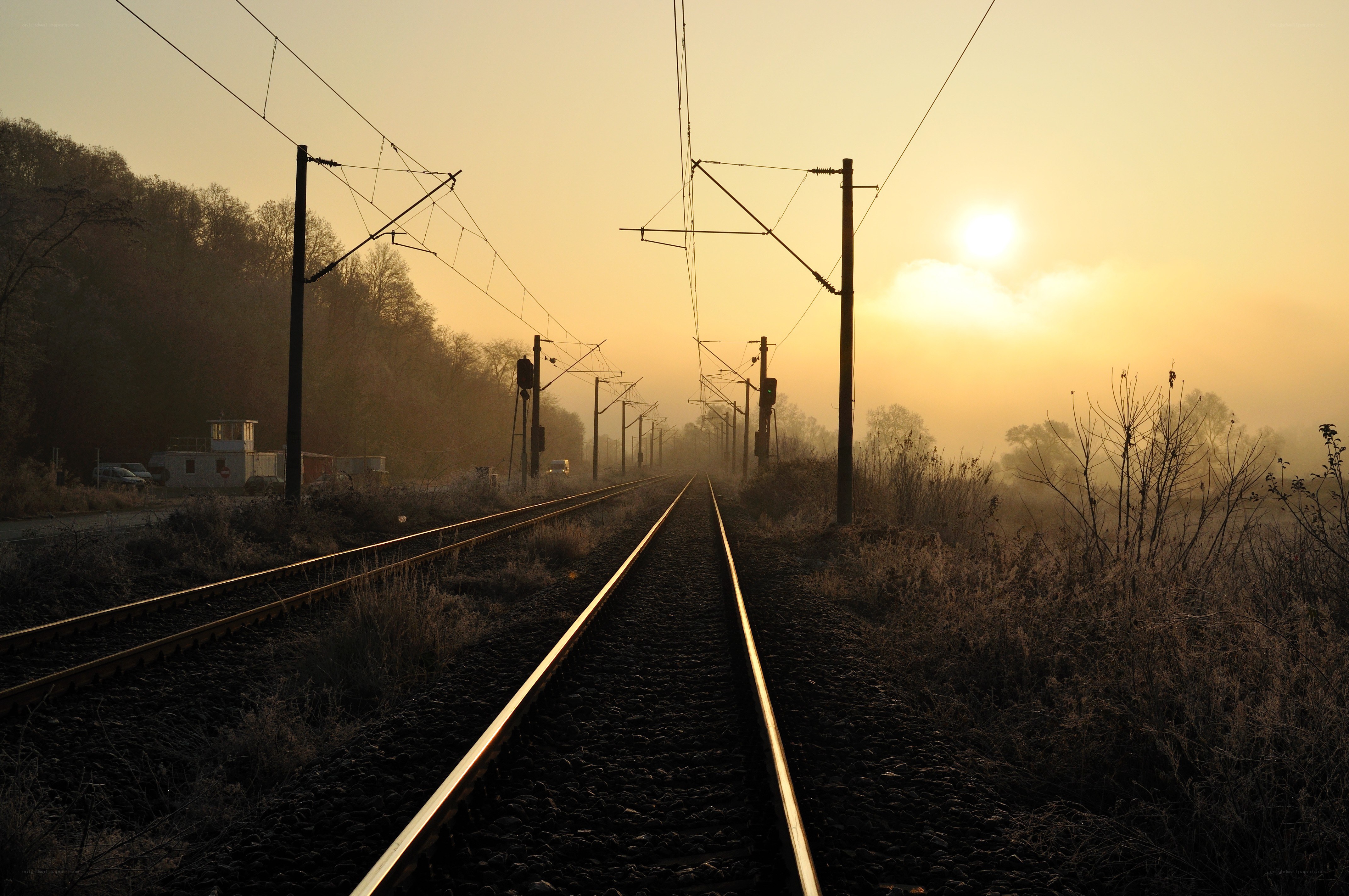 Sunrise over train tracks