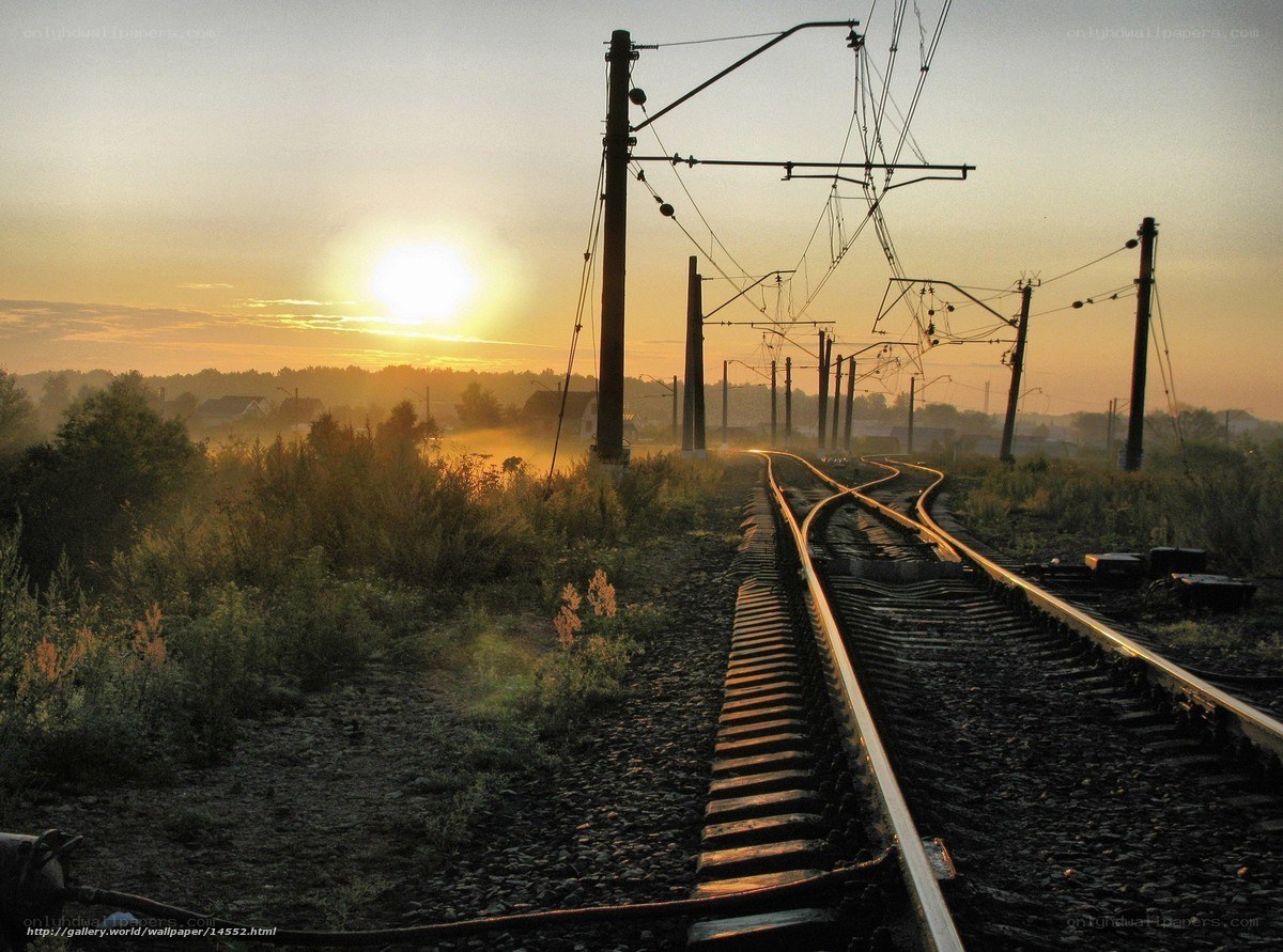 Sunrise over train tracks