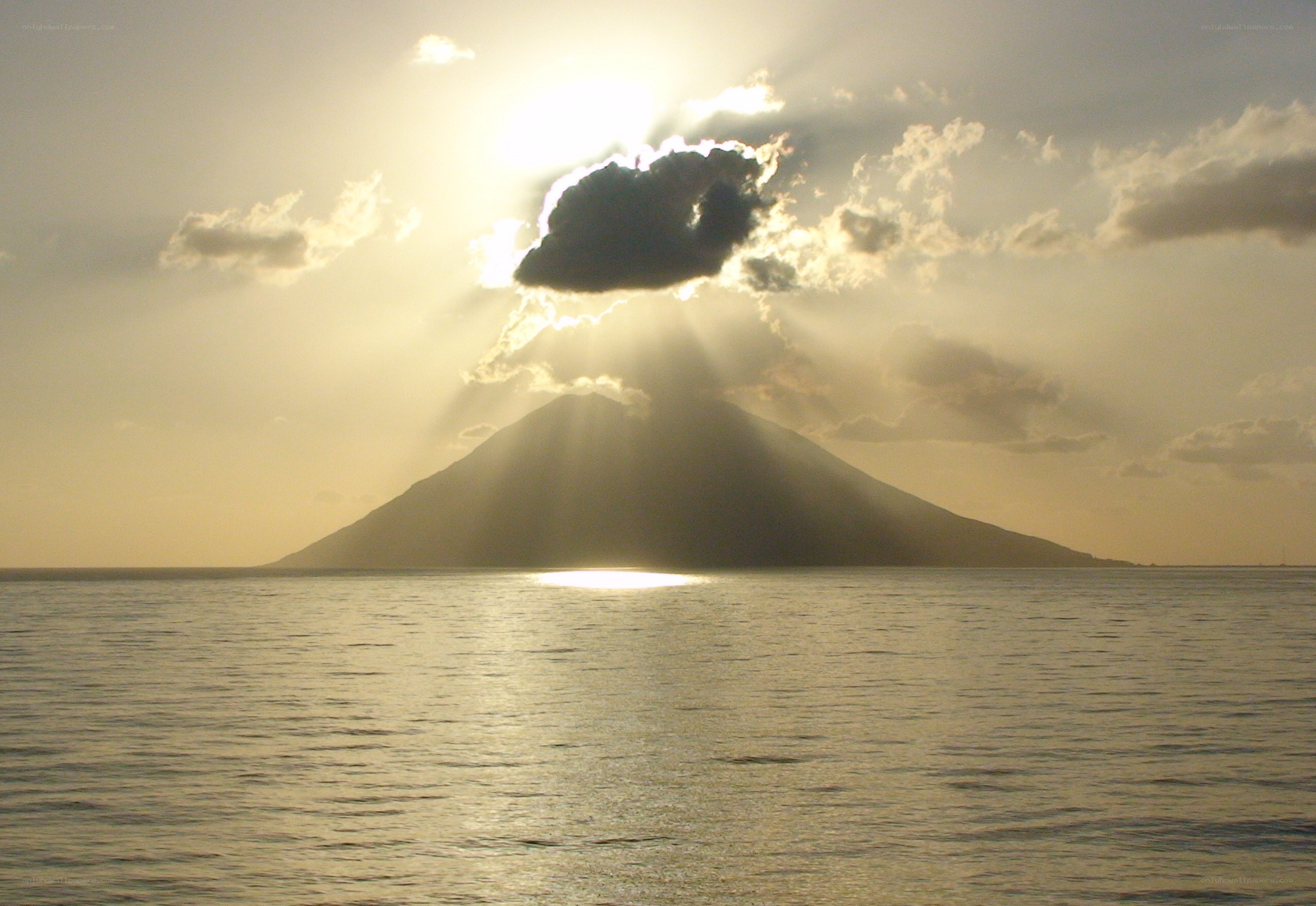 Sunrise over volcanic island