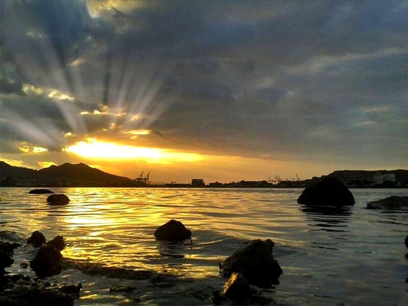 Sunrise over Water — Yellow, Dramatic, Photograph, Mountains