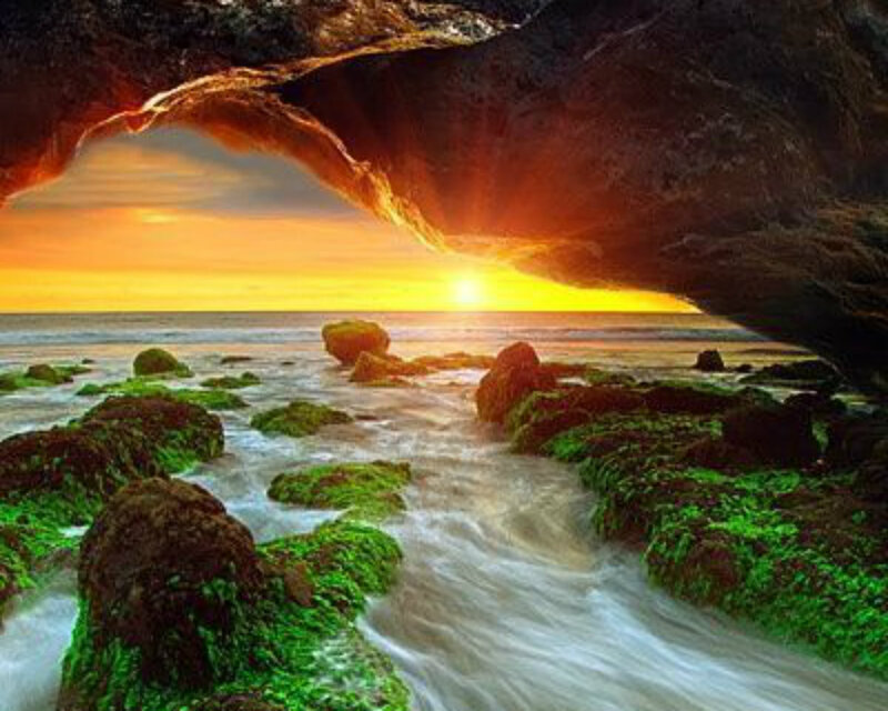 Sunrise Through Cave Arch — Orange