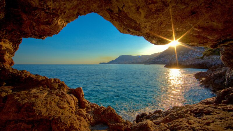 Sunrise Through Cave Opening — Blue, Serene, Photograph, Sea, Mountain, Sun