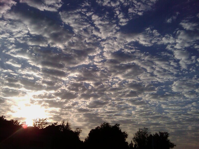 Sunrise Through Clouds — Gray