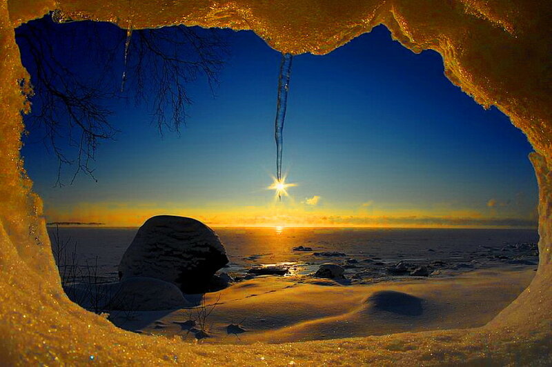 Sunrise Through Ice Cave