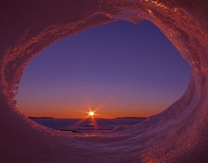 Sunrise Through Ice Tunnel