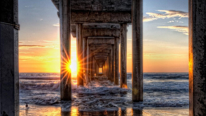 Sunrise Through Pier