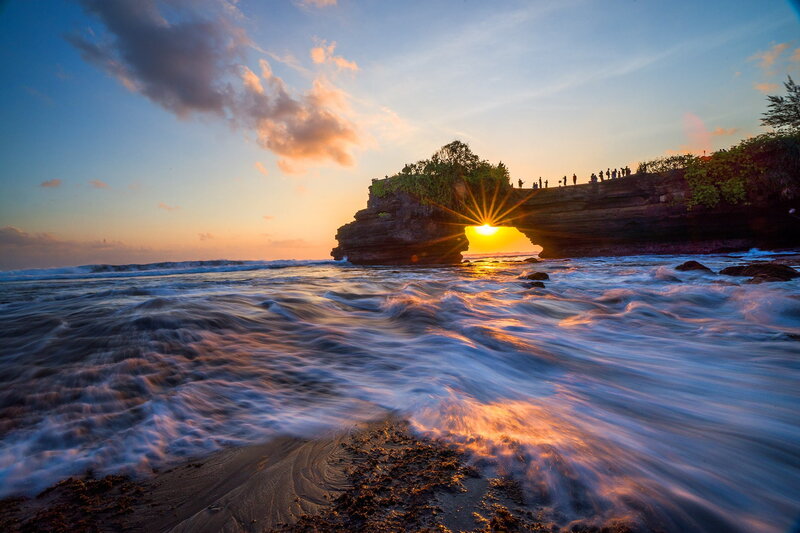 Sunrise Through Rock Arch — Blue, Dramatic, Photograph, Ocean