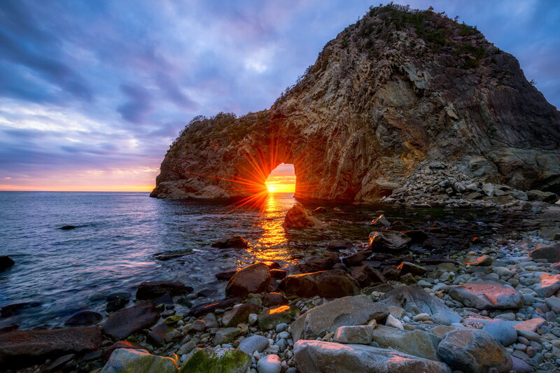 Sunrise Through Rock Arch — Blue, Dramatic, Photograph, Sea