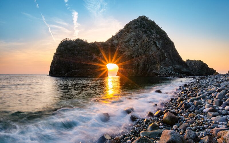 Sunrise Through Rock Arch — Blue, Serene