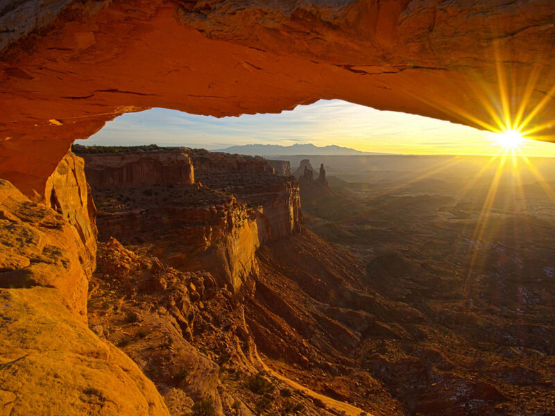 Sunrise Through Rock Arch — Orange, Dramatic, Photograph