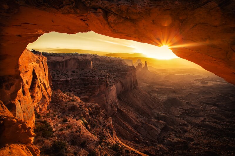 Sunrise Through Rock Arch — Orange, Dramatic, Sunset