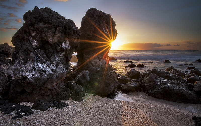 Sunrise Through Rock Arch — Orange, Dramatic