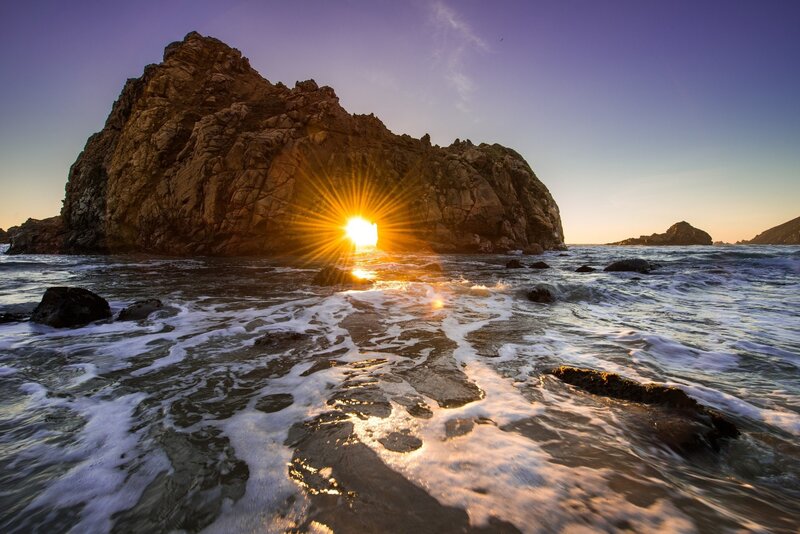 Sunrise Through Rock Arch — Purple, Dramatic, Photograph