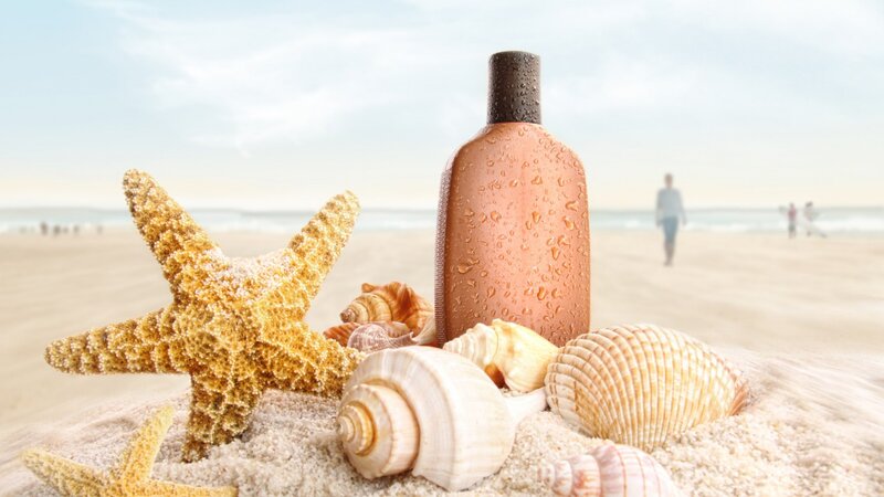 Sunscreen Bottle on Beach