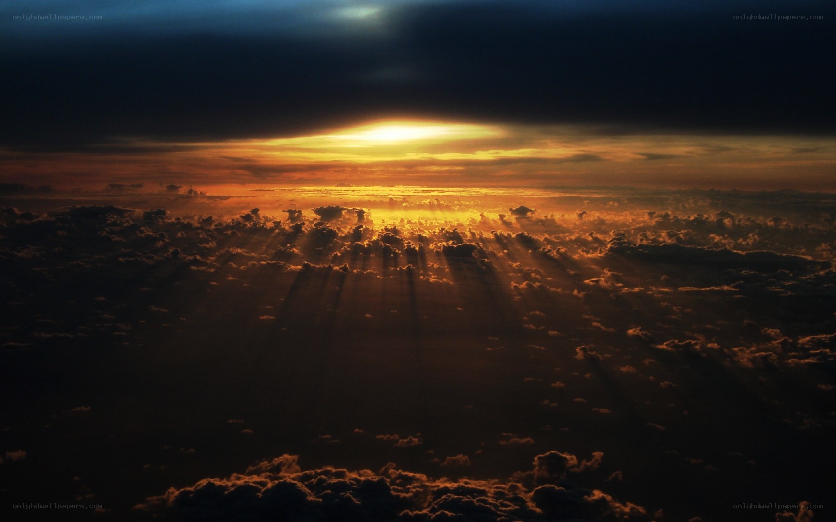 Sunset above the clouds