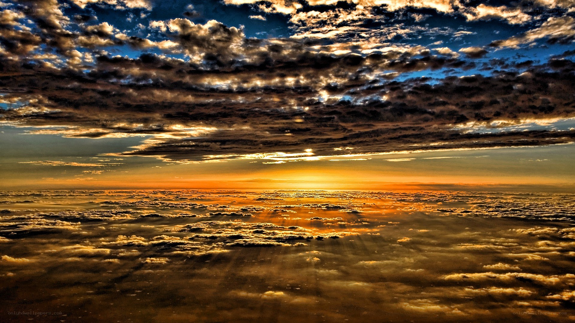 Sunset above the clouds