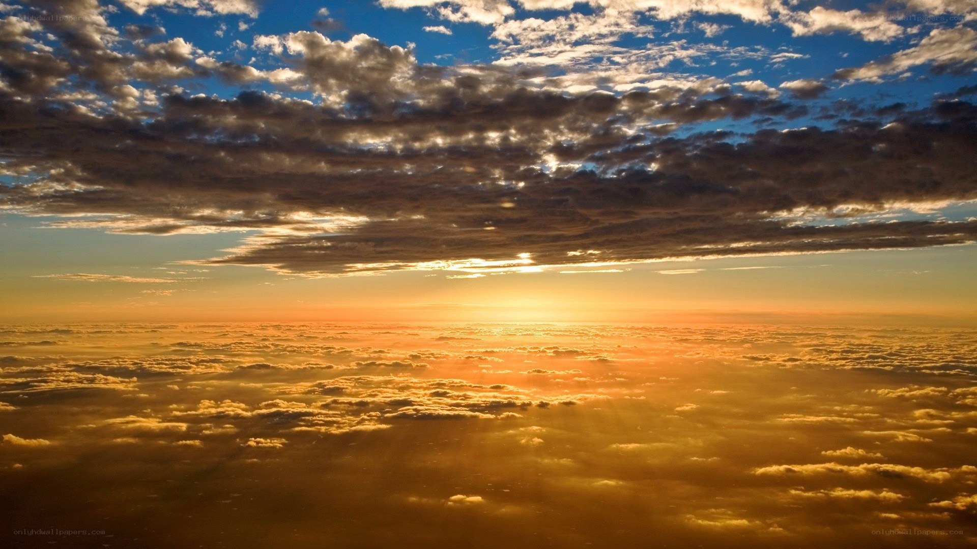 Sunset above the clouds