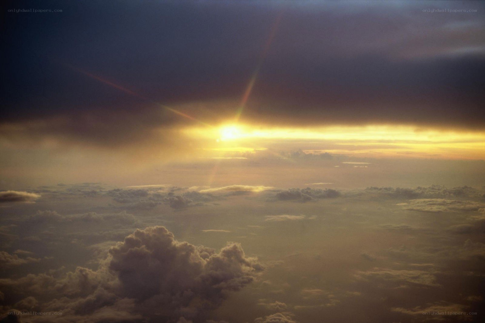 Sunset above the clouds