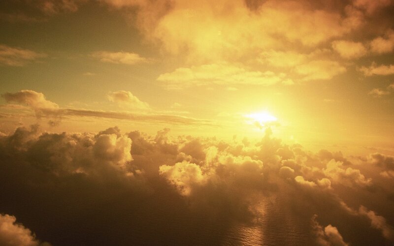 Sunset above the clouds