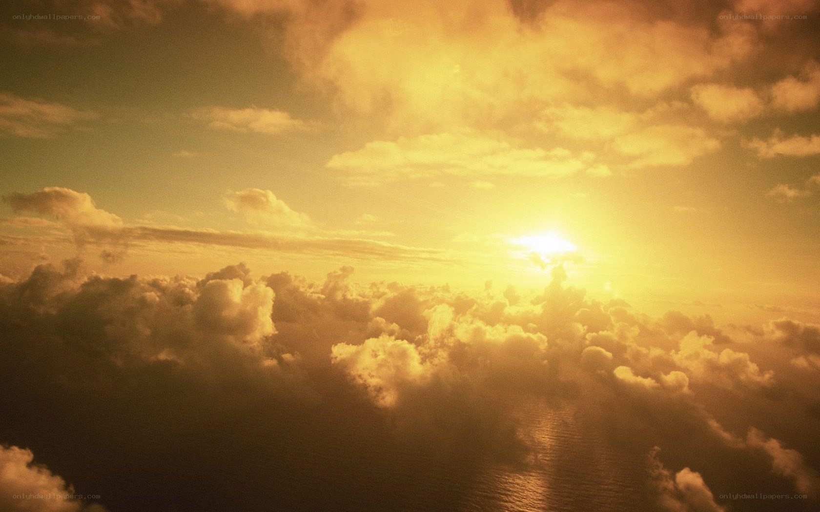Sunset above the clouds