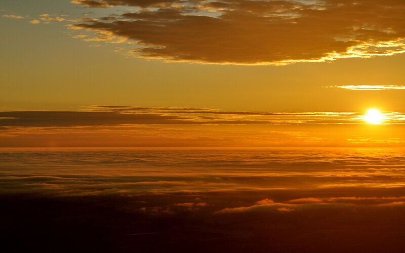 Sunset above the clouds