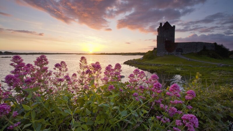 Sunset at a coastal castle
