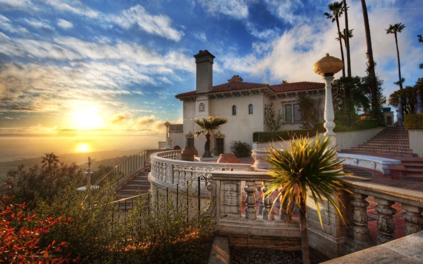 Sunset at a coastal mansion