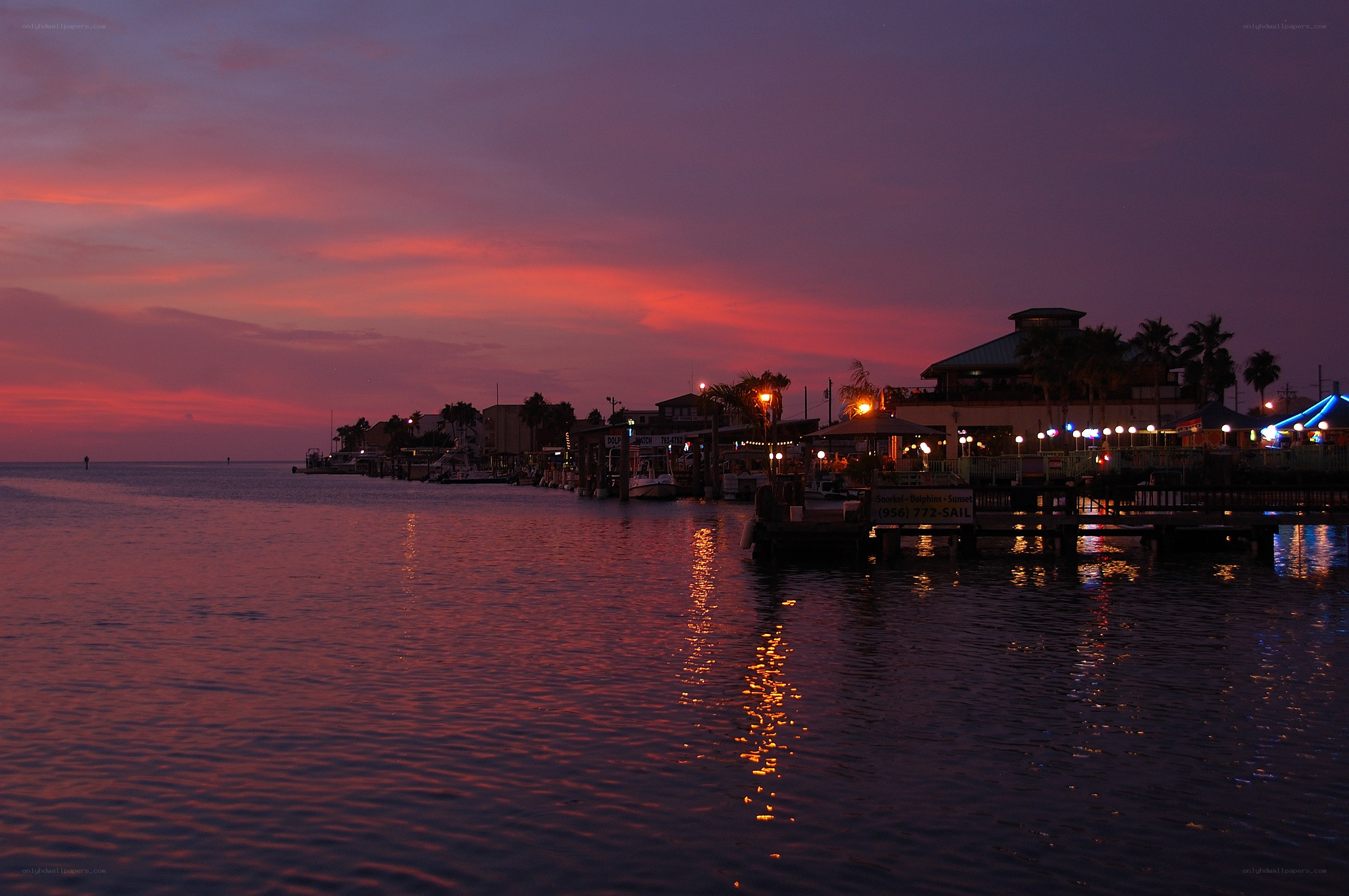 sunset at a coastal marina