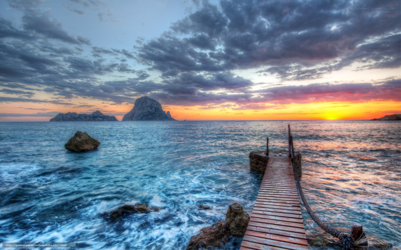 Sunset at a coastal pier