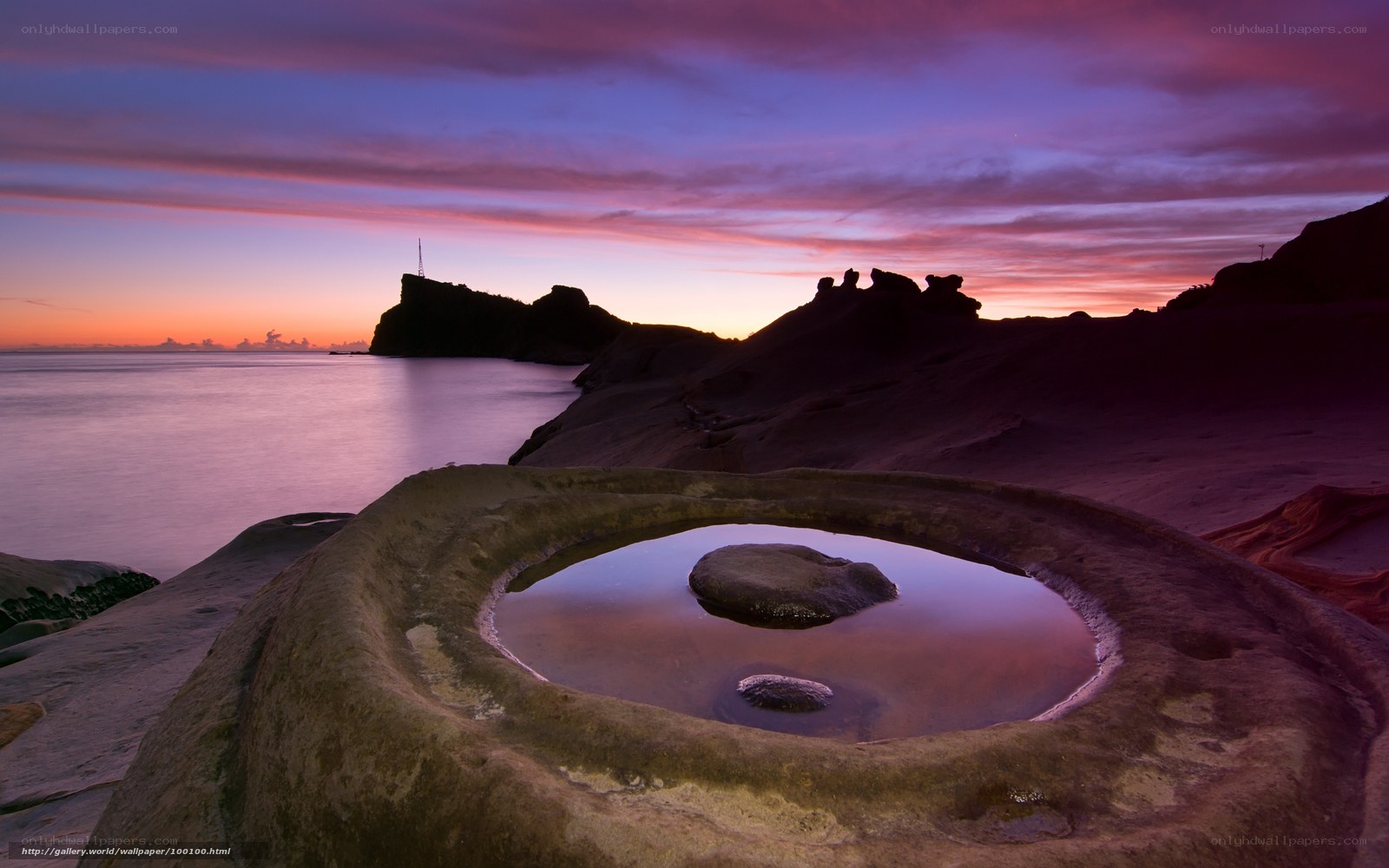 Sunset at a coastal rock pool