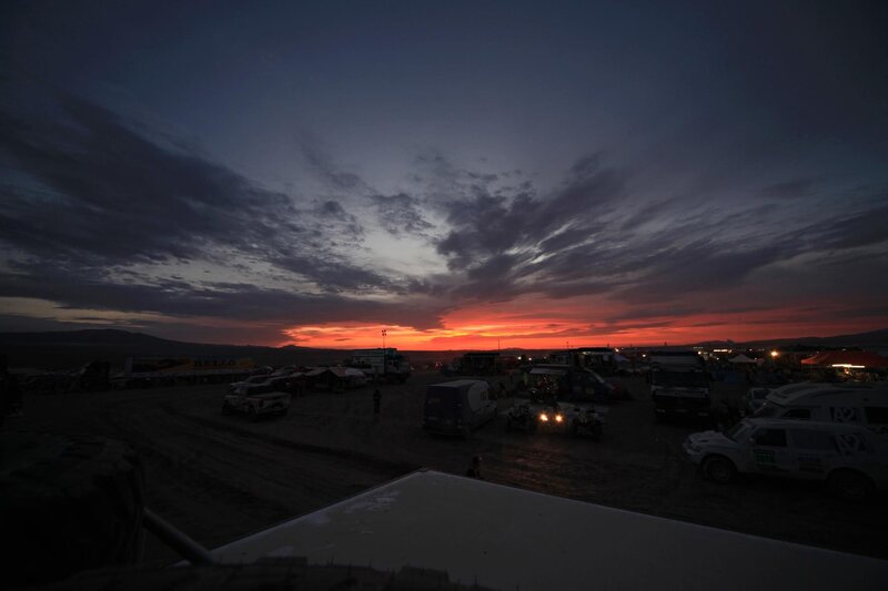 Sunset at a desert race camp