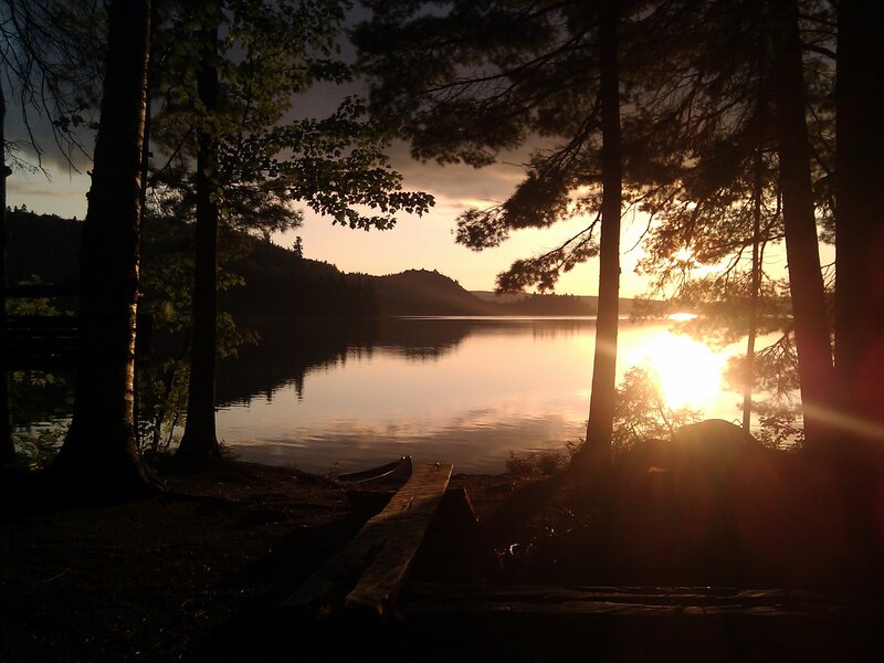 Sunset at a forest lake