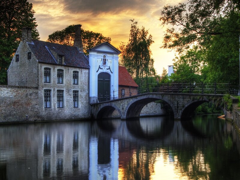 Sunset at a historic canal bridge