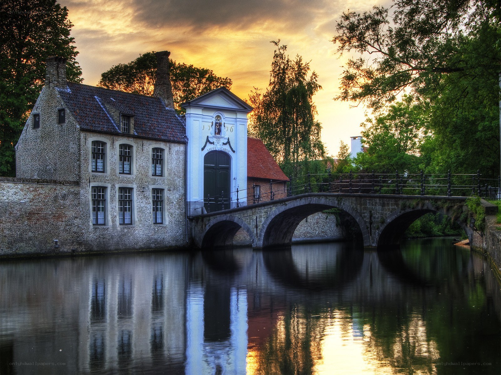 Sunset at a historic canal bridge