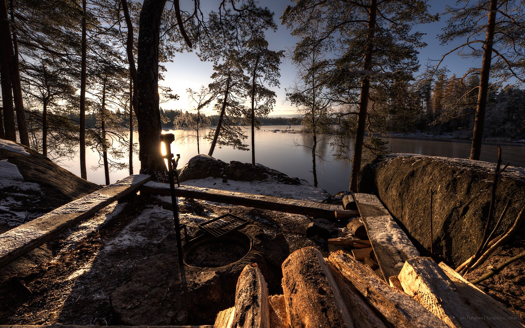 Sunset at a lakeside campsite