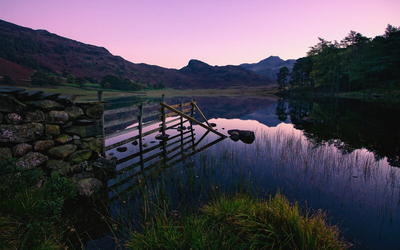 Sunset at a lakeside gate