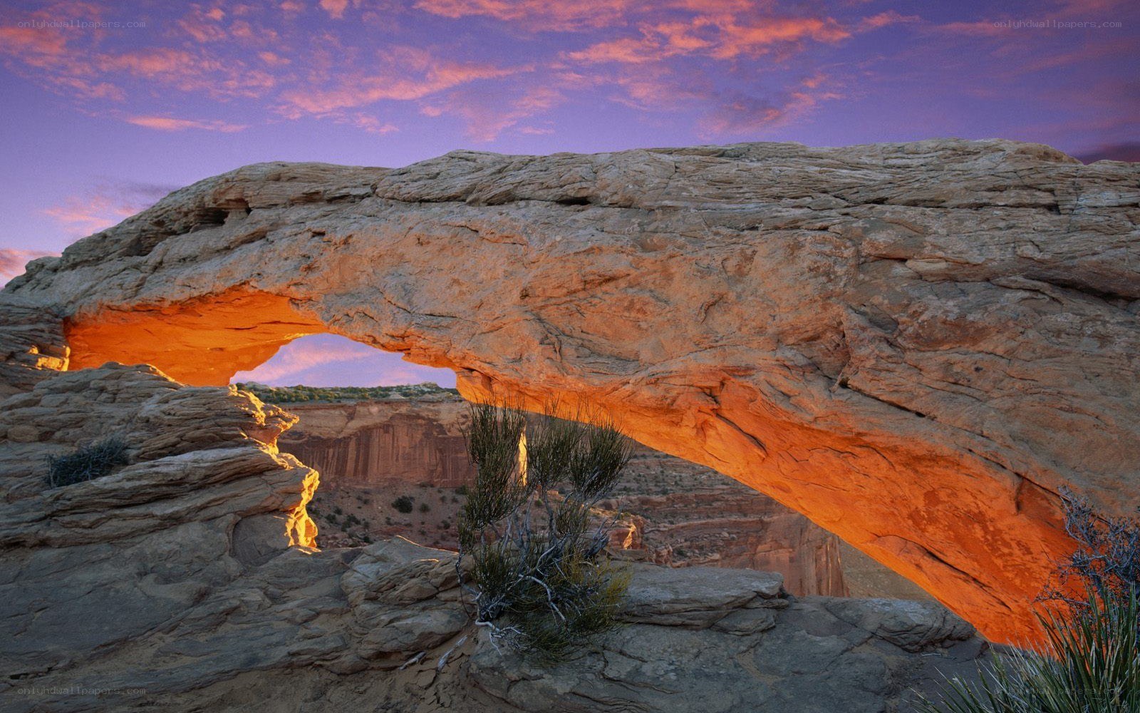 Sunset at a natural rock arch